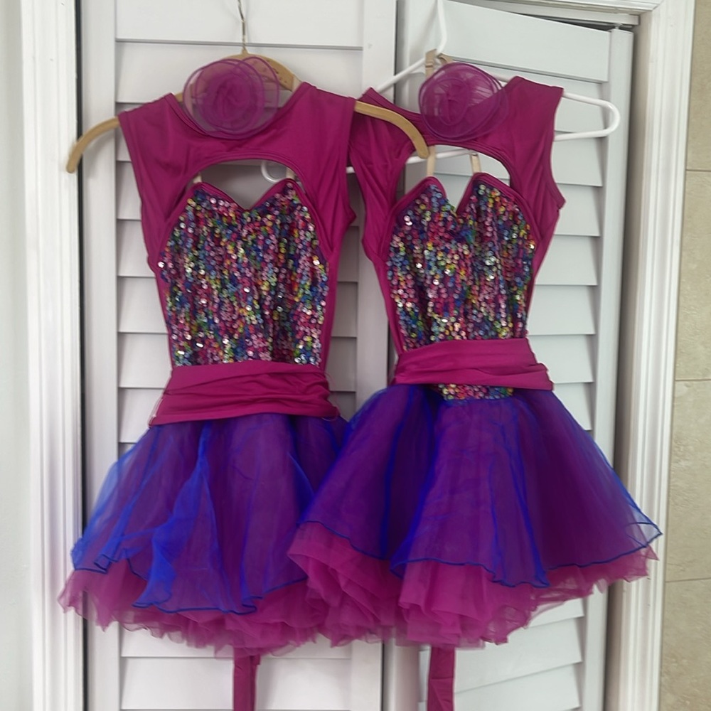 Two sequence dance costumes